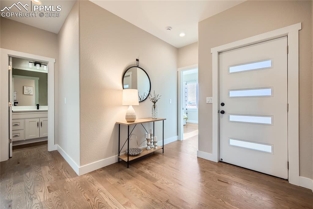 A spacious foyer greets you as you step inside.