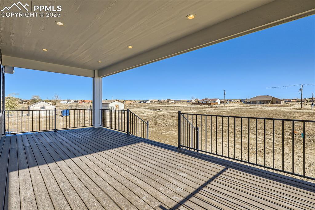 Enjoy your expansive covered back patio/deck, located just off the dining room! There's a gas line for your bbq, too! (You can choose where your gas line/valve will be located.)