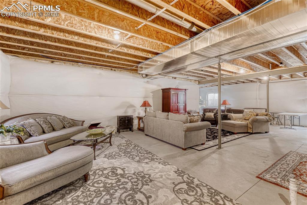 Living area featuring concrete floors