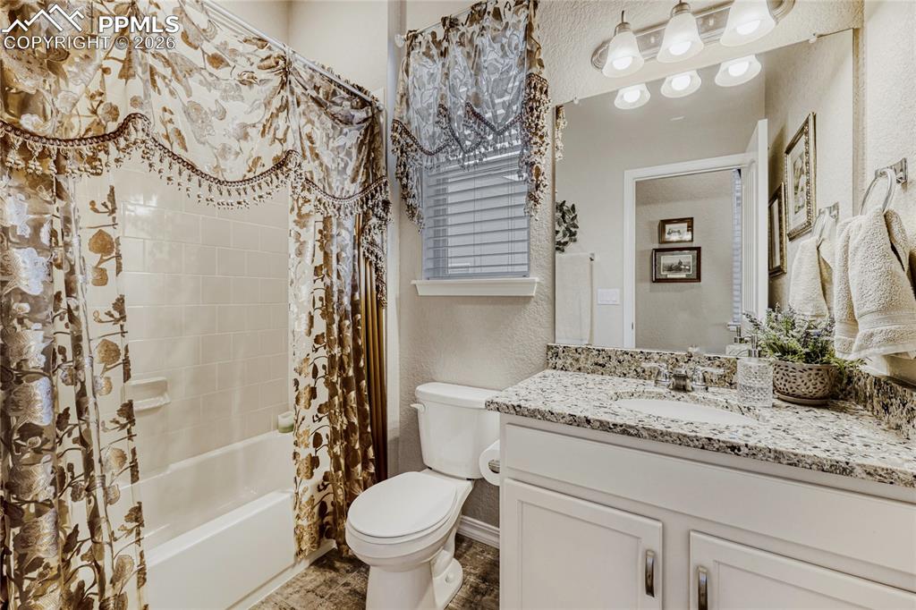 Full bath with shower / tub combo, and vanity