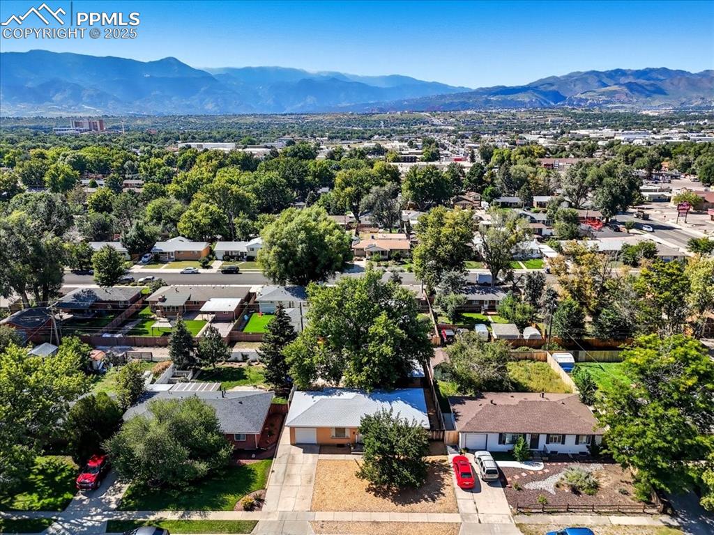 Aerial view of residential area with mountains