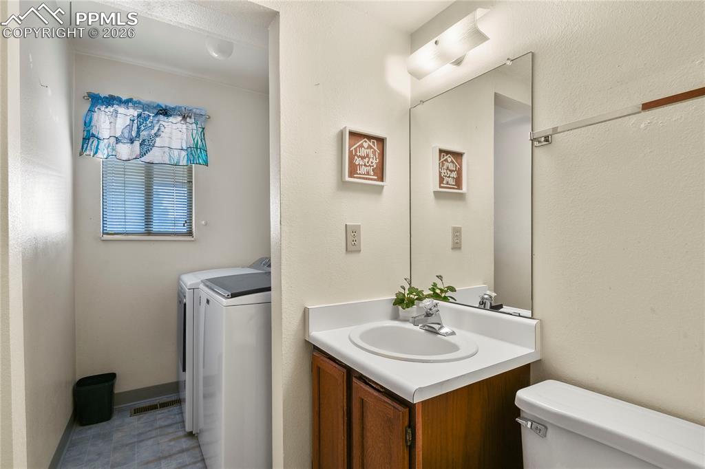 Main Level Guest Bathroom with Laundry 