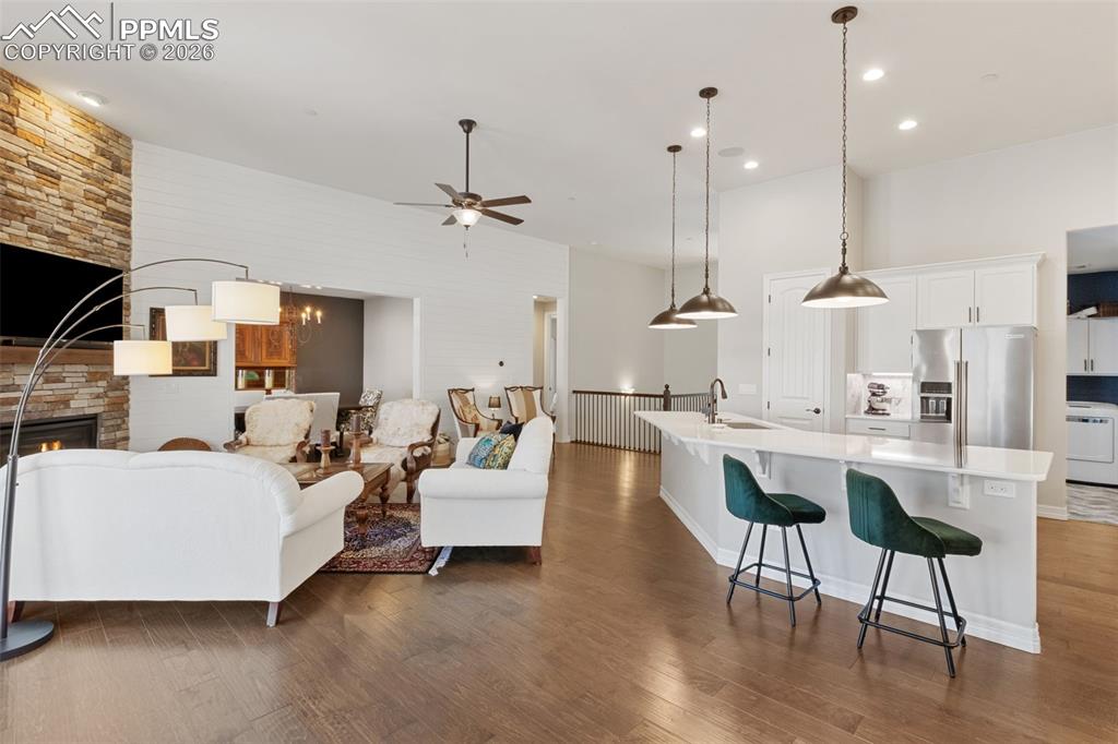 Designed for the modern entertainer, the transition from the chef’s kitchen to the main living space is entirely uninterrupted, allowing conversation to flow easily across the entire main level
