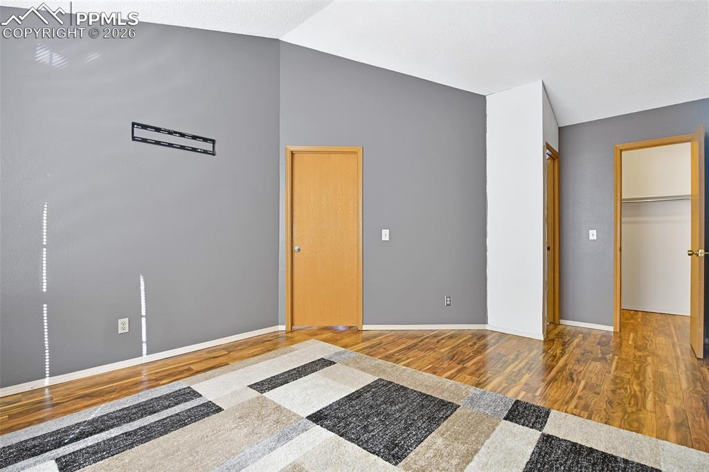 Primary Bedroom With View Of Closet