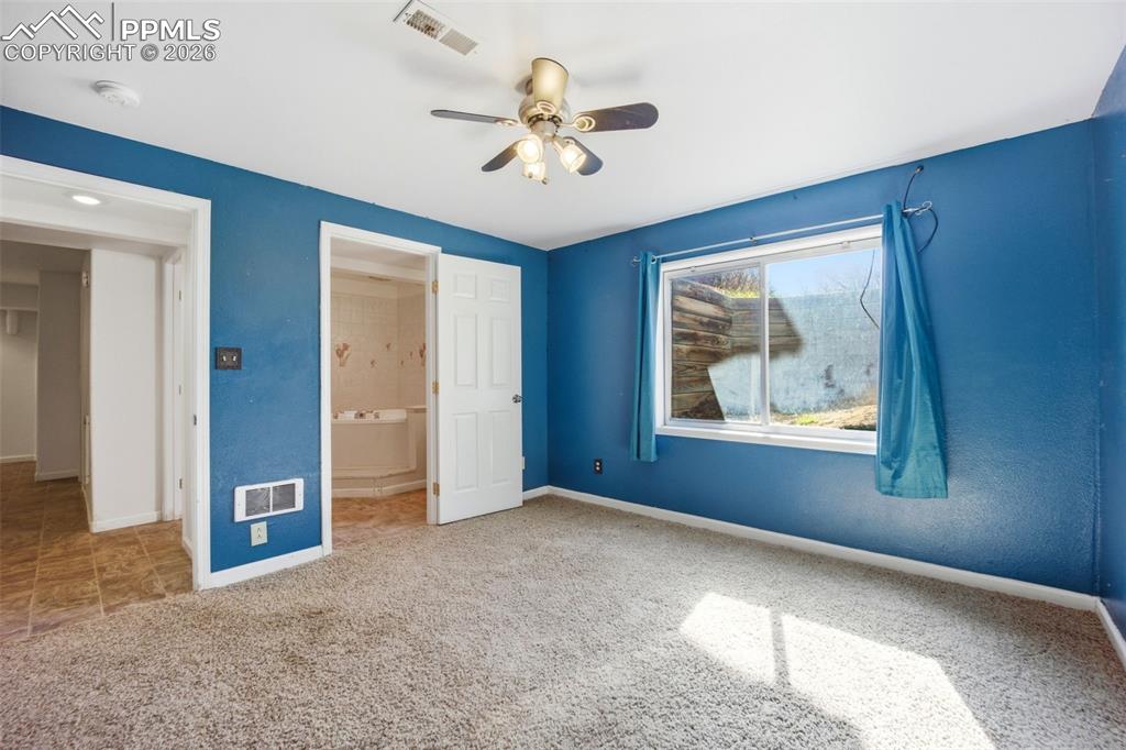 Basement bedroom with garden level window