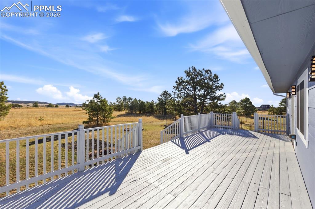 Deck featuring a view of countryside