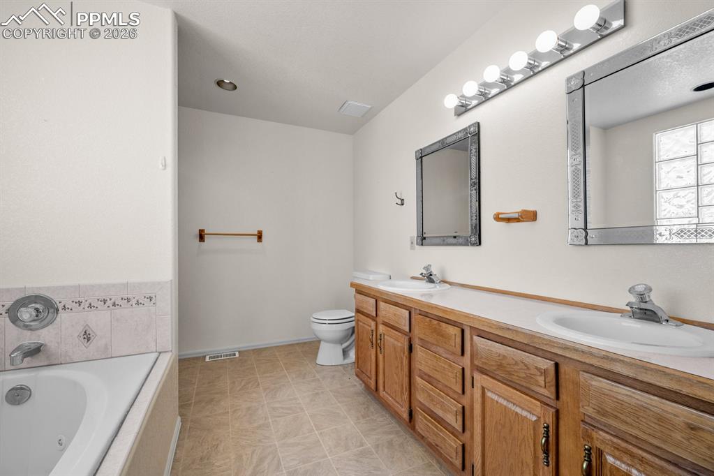 Bathroom with a garden tub and double vanity