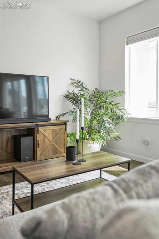 Living room featuring baseboards
