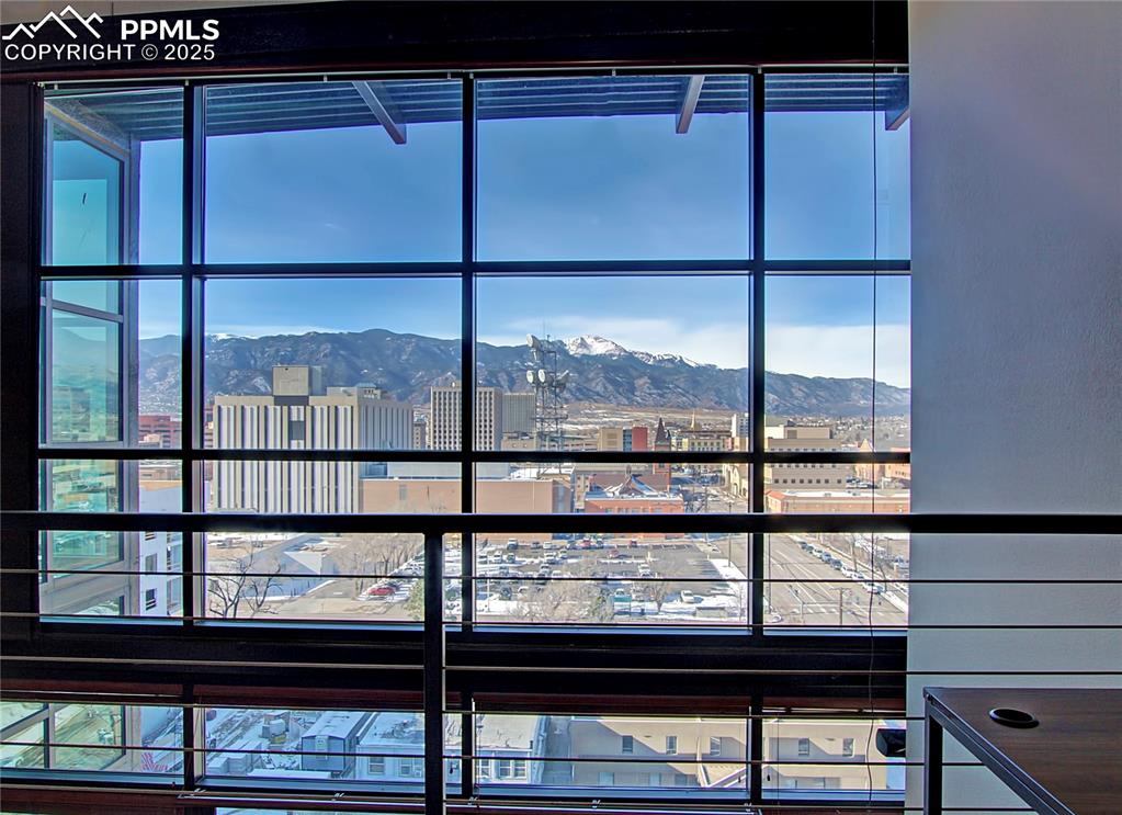 Detailed view of a mountainous background and a city view