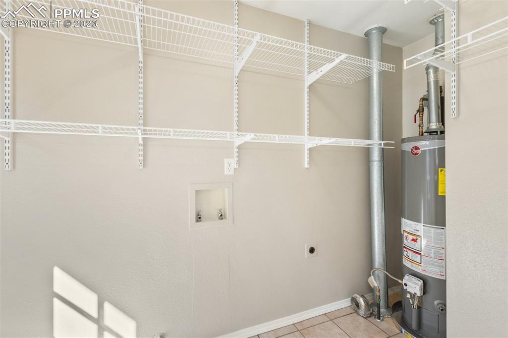 Plenty of Shelving for Extra Storage. Natural Gas is right there if you'd prefer Gas for Dryer