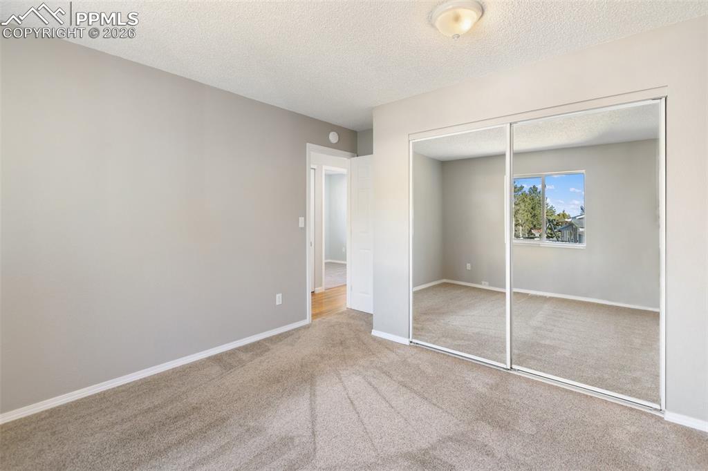 Primary Bedroom with Extra Deep Closet with Organizers