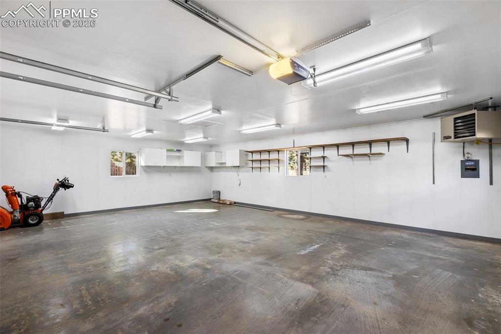 Insulated, Drywalled and Heated!  This Garage/Workshop delivers.  220V too!