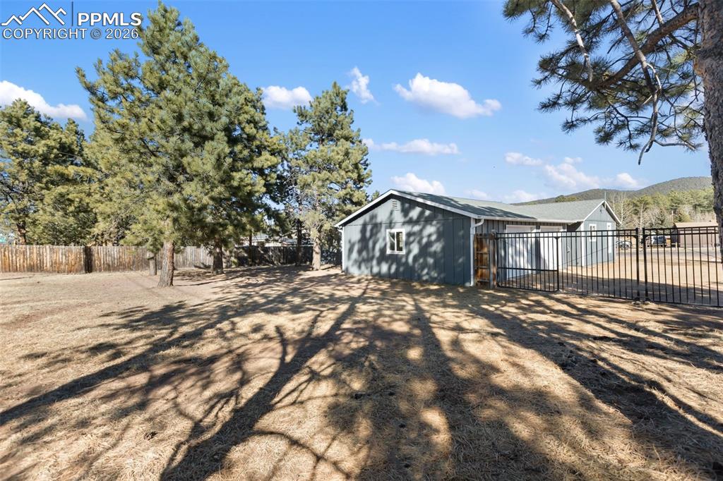 Amazing Backyard with lots of room to store your RV, Trailers or Work Vehicles behind a locked gate