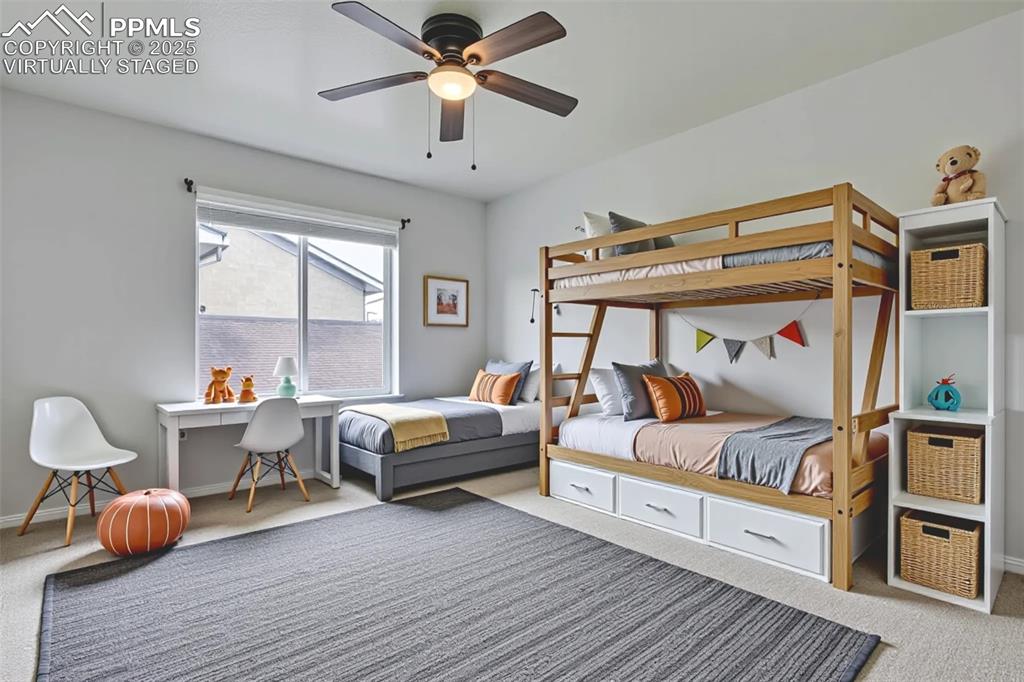 Virtually Staged - Secondary bedroom  with ceiling fan and baseboards