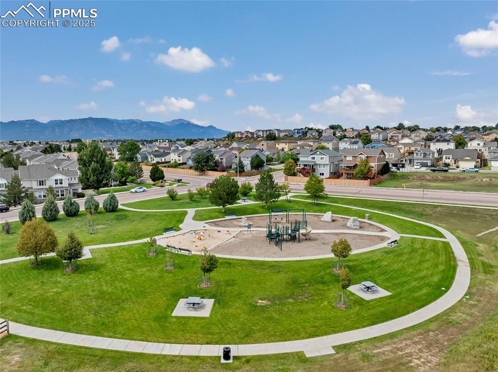 View of home's community featuring a park/playground